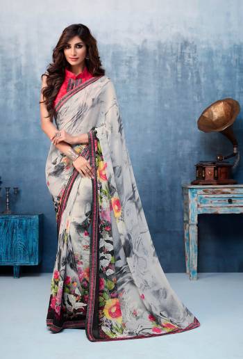 Simple And Elegant Looking Printed Saree Is Here In Light Grey Color. This Printed Saree Is Georgette Based Paired With Art Silk Fabricated Blouse. It Is Beautified With Fancy Lace Border.