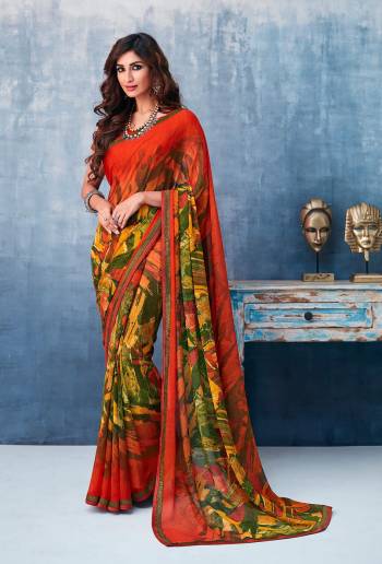 Here Is A Beautiful Printed Saree In Orange & Yellow Color For the Upcoming Festive Season. This Pretty Saree Is Fabricated On Georgette Paired With Art Silk Fabricated Blouse. It Is Beautified With Prints And Lace Border. 