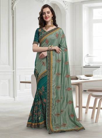 Go With The Pretty Shades Of Green Wearing This Heavy Designer Saree In Pastel Green And Teal Green Color Paired With Teal Green Colored Blouse. This Saree And Blouse Are Silk Based Beautified With Heavy Embroidery All Over. Buy Now.