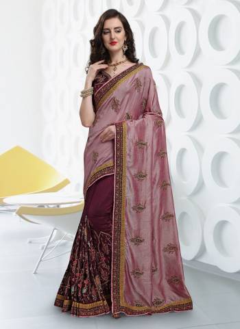 Go With The Pretty Shades Of Pink Wearing This Heavy Designer Saree In Pink And Wine Color Paired With Wine Colored Blouse. This Saree And Blouse Are Silk Based Beautified With Heavy Embroidery All Over. Buy Now.