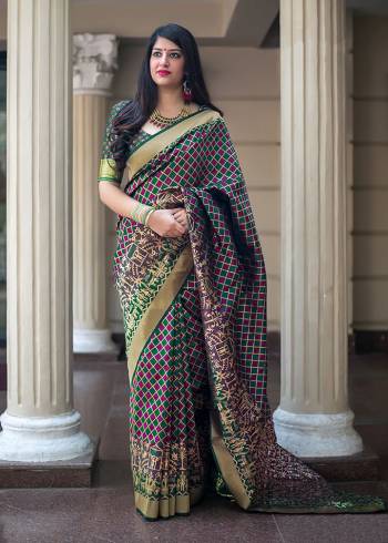 Flaunt Your Rich And Elegant Taste In Silk With This Subtle Weaved Saree In Dark Green And Purple Color. This Saree And Blouse Are Fabricated On Banarasi Art Silk Beautified With Pretty Small Butti Weave All Over It. Its Silk Based Fabric Will Give A Rich Look To Your Personality