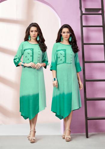 Grab This Pretty Simple And Elegant Looking Readymade Kurti In Sea Green Fabricated On Rayon Slub. This Kurti Is Light In Weight And Easy To Carry All Day Long. 