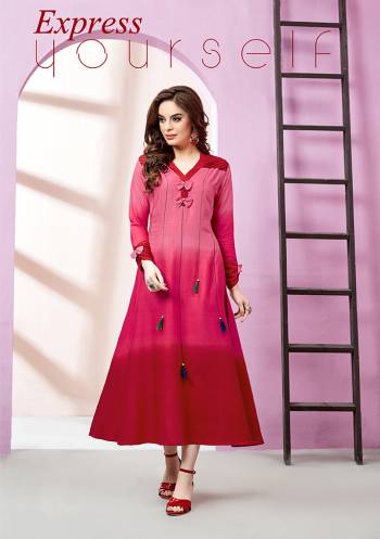 Here Is A Very Shaded Readymade Designer Kurti In Pink And Red Color Fabricated On Rayon Slub. This Pretty Kurti Is Light Weight And Easy To Carry All Day Long. 