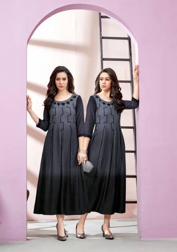 For A Bold And Beautiful Look, Grab This Designer Readymade Long Kurti In Grey And Black Color Fabricated On Rayon Slub. Its Fabric Is Soft Towards Skin And Easy To Carry All Day Long. 