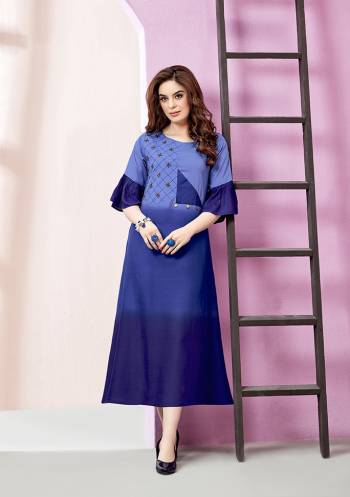 Add Some Semi-Casuals Wearing This Designer Readymade Long Kurti In Shades Of Blue. It Is Fabricated On Rayon Slub. It Is Light Weight And Easy To Carry All Day Long. 