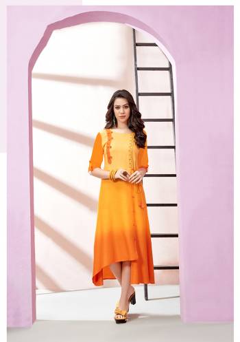 This Festive Season, Adorn An Elegant Look Wearing This Readymade Long Kurti In Musturd Yellow Color Fabricated On Rayon Slub. Buy Now.