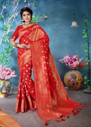 Adorn The Pretty Angelic Look Wearing This Lovely Silk Based Saree In Red Color. This Saree And Blouse Are Fabricated On Banarasi Art Silk Beautified With Attractive Weave. 