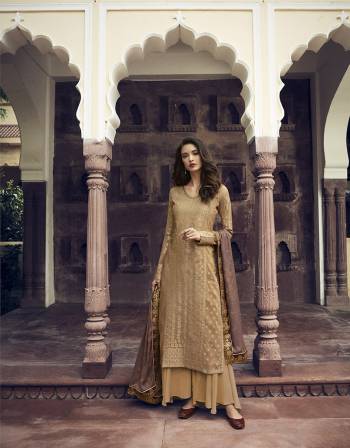 Simple And Elegant Looking Designer Straight Suit Is Here In Beige Color Paired With Elegant Light Beige Colored Dupatta. Its Top Is Fabricated On Jacquard Silk Paired With Santoon Bottom And Georgette Fabricated Stone Work Dupatta. 