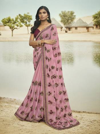 Look Pretty Wearing This Lovely Designer Saree In Pink Color Paired With Contrasting Wine Colored Blouse. This Saree Is Fabricated On Silk Chiffon Paired With Art Silk Fabricated Blouse. Buy This Pretty Saree Now.