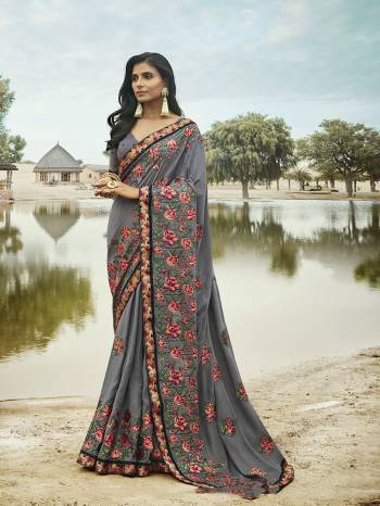 Rich And Elegant Looking Heavy Designer Saree Is Here In Grey Color Paired With grey Colored Blouse. This Saree Is Fabricated on Soft Silk Paired With art Silk Fabricated Blouse. Buy This Heavy And Detailed Embroidered Saree Now.