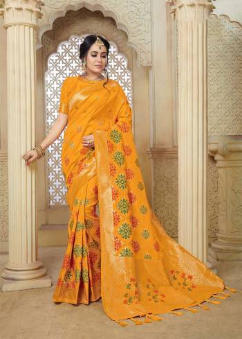 Celebrate This Festive Season With Beauty And Comfort Wearing This Pretty Silk Based Saree In Musturd Yellow Color Paired With Musturd Yellow Colored Blouse. This Saree And Blouse Are Fabricated On Banarasi Art Silk Beautified With Weave All Over. 