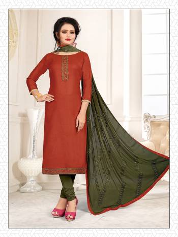 Simple and Elegant Looking Suit Is Here In Rust Orange And Dark Green Color. This Dress Material Is Cotton Based Paired With Chiffon Fabricated Dupatta. Its Top And Dupatta Are Beautified With Subtle Thread Work Giving An Elegant Look. 