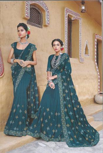Add This Pretty Shade To your Wardrobe With This Teal Blue Colored Designer Saree Fabricated On Soft Silk. This Pretty Saree Is Beautified With Elegant Thread Work. 