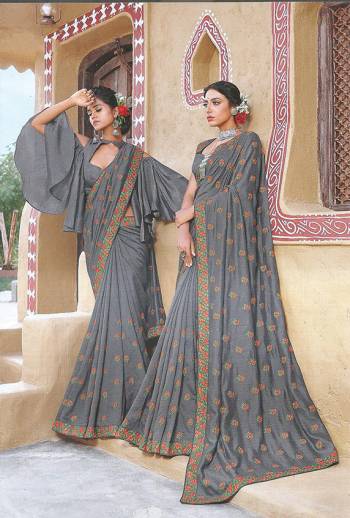 Flaunt Your Rich And Elegant Taste Wearing This Designer Saree In Rich Grey Color Paired With Grey Colored Blouse. This Saree Is Fabricated On Soft Silk Paired With Art Silk Fabricated Blouse. Buy Now.