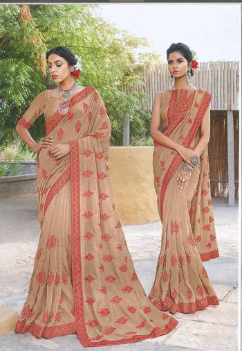 You Will Definitely Earn Lots Of Compliments Wearing This Designer Silk Based Saree In Rich Beige Color Paired With Beige Colored Blouse. It Is Beautified With Contrasting Thread Embroidered Buttis. 