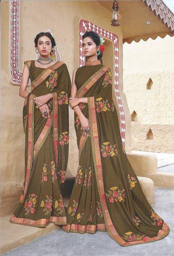 Look Attractive In This Elegant Looking Designer Saree In Dark Olive Green Color Paired With Dark Olive Green Colored Blouse. This Saree And Blouse Silk Based Beautified With Pretty Thread Work. 