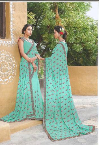 Add This Pretty Shade To your Wardrobe With This Aqua Blue Colored Designer Saree Fabricated On Soft Silk. This Pretty Saree Is Beautified With Elegant Thread Work. 