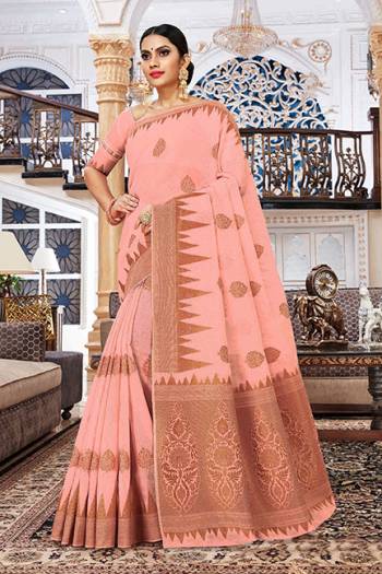 Add This Lovely Saree To Your Wardrobe In Dark Peach Color Fabricated On Cotton Silk. Its Pretty Color And Rich Fabric Will Earn You Lots Of Compliments From Onlookers. 