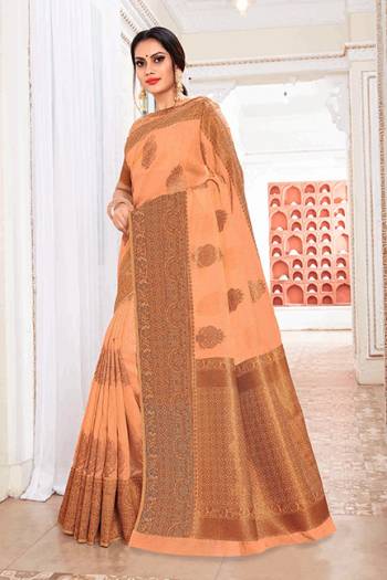 Add This Lovely Saree To Your Wardrobe In Orange Color Fabricated On Cotton Silk. Its Pretty Color And Rich Fabric Will Earn You Lots Of Compliments From Onlookers. 