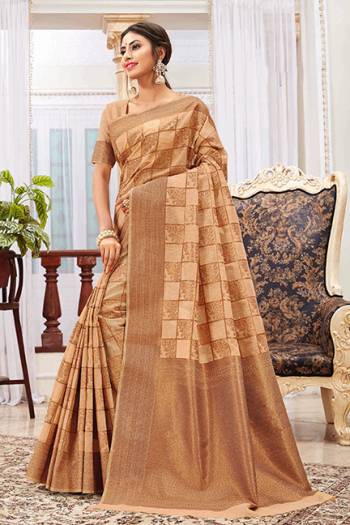 Flaunt Your Rich And Elegant Taste Wearing This Beautiful Saree In Beige Color. This Pretty Saree And Blouse Are Fabricated On Cotton Silk Which IS Durable, Light Weight And Easy To Care For. Buy Now.