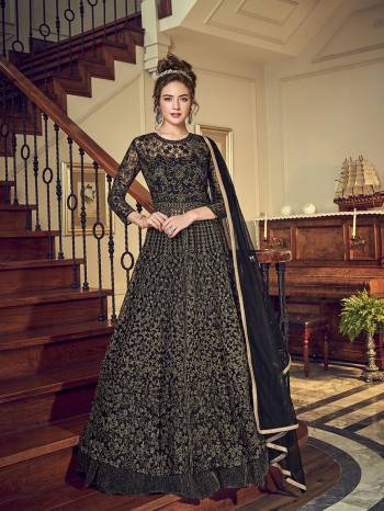 For A Bold And Beautiful Look, Grab This Designer Indo-Western Pair In All Over Black Color. Its Embroidered Top Is Net Based Paired With Santoon Bottom And Chiffon Fabricated Dupatta. Also For Another Look It Comes With A Satin Fabricated Lehenga. 