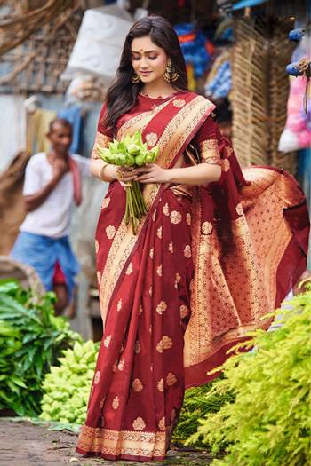 For A Royal Look, Grab This Lovely Silk Based Saree In Maroon Color. This Saree And Blouse are Fabricated On Satin Silk Beautified With Weave All Over. 