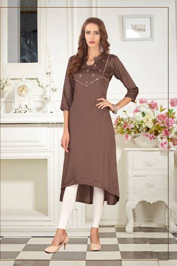 Elegant Looking Readymade Straight Kurti Is Here In Brown Color Fabricated On Soft Satin Silk Beautified With Thread Work. You Can Pair This Up Same Or Contrasting Colored Leggings Or Pants. 