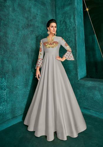 Celebrate This Festive Season Wearing This Designer Readymade Gown In Grey Color Fabricated On Soft Art Silk Beautified With Embroidery. Its Rich Fabric And Color Will Definitely Earn You Lots Of Compliments From Onlookers.?