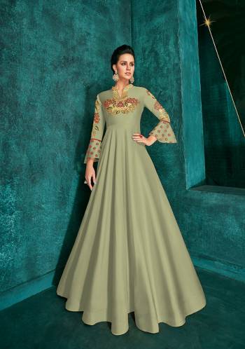 Celebrate This Festive Season Wearing This Designer Readymade Gown In Pastel Green Color Fabricated On Soft Art Silk Beautified With Embroidery. Its Rich Fabric And Color Will Definitely Earn You Lots Of Compliments From Onlookers.?