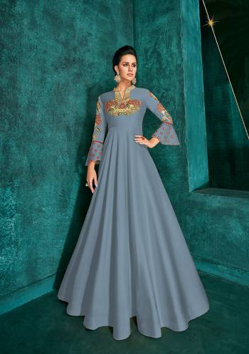 Celebrate This Festive Season Wearing This Designer Readymade Gown In Steel Blue Color Fabricated On Soft Art Silk Beautified With Embroidery. Its Rich Fabric And Color Will Definitely Earn You Lots Of Compliments From Onlookers.?