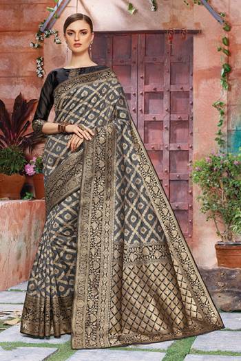 You Will Definitely Earn Lots Of Compliments In Traditional Look?Wearing This Beautiful Silk Based Saree In Dark Grey And Black Color. This Saree Is Light Weight, Durable And Easy To Carry All Day Long.