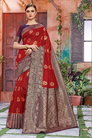 Celebrate This Festive Season With Beauty And Comfort In This Light Weight Silk Based Saree In Maroon And Purple Color. This Pretty Weaved Saree And Blouse Are Fabricated On Art Silk Which Gives A Rich Look To Your Personality.