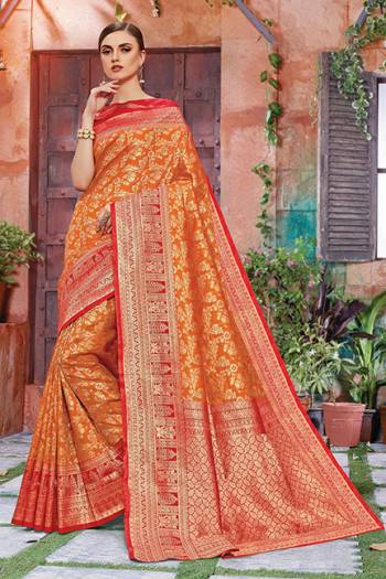 Celebrate This Festive Season With Beauty And Comfort In This Light Weight Silk Based Saree In Orange And Red Color. This Pretty Weaved Saree And Blouse Are Fabricated On Art Silk Which Gives A Rich Look To Your Personality.