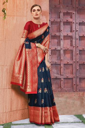 You Will Definitely Earn Lots Of Compliments In Traditional Look?Wearing This Beautiful Silk Based Saree In Navy Blue And Red Color. This Saree Is Light Weight, Durable And Easy To Carry All Day Long.