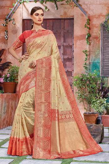 Celebrate This Festive Season With Beauty And Comfort In This Light Weight Silk Based Saree In Cream And Orange Color. This Pretty Weaved Saree And Blouse Are Fabricated On Art Silk Which Gives A Rich Look To Your Personality.