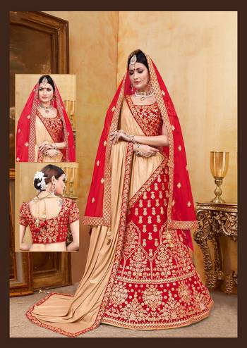 Be The Prettiest Bride Wearing This Very Beautiful And Heavy Embroidered Designer Bridal Lehenga Choli In Red Color Paired With Red Colored Dupatta. This Lehenga Choli Is Velvet Based Paired With Net Fabricated Dupatta. Buy This Beautiful Lehenga Choli Now