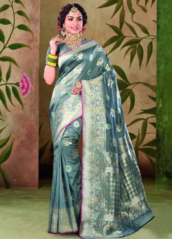 Flaunt Your Rich And Elegant Taste Wearing This Beautiful Saree In Grey Color. This Pretty Saree And Blouse Are Fabricated On Satin Silk Which IS Durable, Light Weight And Easy To Care For. Buy Now