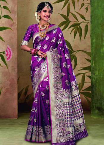 Enhance Your Personality In This Rich Purple Colored Saree. This Saree And Blouse are Fabricated On Satin Silk Beautified With Elegant Weave.