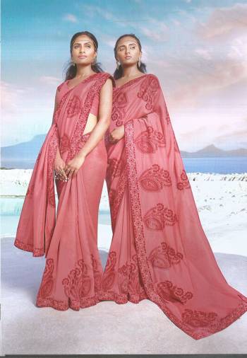 For A Bold And Beautiful Look, Here Is Pink Colored Designer Silk Based Saree Paired With Pink Colored Blouse. It Is Beautified With Bold Thread Embroidered Motifs. 