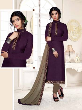 Celebrate This Festive Season With Beauty And Comfort Wearing This Designer Suit In Purple Color Paired With Contrasting Sand Grey Colored Bottom And Dupatta. This Dress Material Is Cotton Based Paired With Chiffon Fabricated Dupatta. 