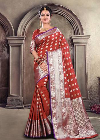 Enhance Your Personality Wearing This Designer Silk Based Saree In Maroon Color Paired With Maroon Colored Blouse. This Saree And Blouse Are Satin Silk Based Beautified With Small Tribal Weave All Over. 