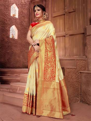 Flaunt  Your Rich And Elegant Taste Wearing This Designer Silk Based Saree In Cream Color Paired With Red Colored Blouse. This Saree And Blouse are Fabricated On Art Silk Beautified With Weave All Over. 