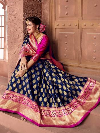 Enhance Your Personality Wearing This Navy Blue Colored Saree Paired With Contrasting Rani Pink Colored Blouse .This Saree And Blouse Are Silk Based Which Gives A Rich Look To Your Personality. 