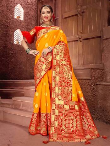 Celebrate This Festive Season With A Traditional Look In Musturd Yellow Colored Saree Paired With Contrasting Red Colored Blouse. This Saree And Blouse Are Fabricated on Art Silk Which Is Light Weight, Durable And Easy To care For. 