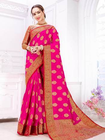 Shine Bright In This Attractive Rani Pink Colored Saree. This Saree And Blouse Are Silk Based Beautified With Heavy Weave. Buy This Saree Now.