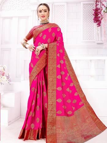 Shine Bright In This Attractive Rani Pink Colored Saree. This Saree And Blouse Are Silk Based Beautified With Heavy Weave. Buy This Saree Now.