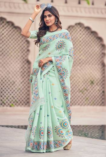 Here Is a Very Pretty Printed Saree In Pastel Green Color Paired With Pastel Green Colored Blouse. This Saree And Blouse Are Fabricated On Tussar Art Silk. Its Pretty Subtle Color Will Definitely Earn You Lots Of Compliments From Onlookers. 