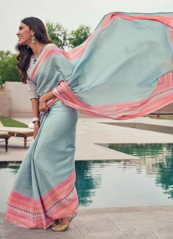 Add This Beautiful Saree For Semi-Casuals Or Festive Wear In Aqua Blue Color. This Saree Is Fabricated On Tussar Art Silk Beautified With Prints, It Is Light Weight And Easy To Carry All Day Long. 