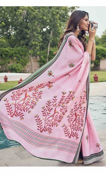 Here Is a Very Pretty Printed Saree In Pink Color Paired With Pastel Green Colored Blouse. This Saree And Blouse Are Fabricated On Tussar Art Silk. Its Pretty Subtle Color Will Definitely Earn You Lots Of Compliments From Onlookers. 