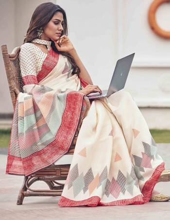 Here Is a Very Pretty Printed Saree In Cream Color Paired With Pastel Green Colored Blouse. This Saree And Blouse Are Fabricated On Tussar Art Silk. Its Pretty Subtle Color Will Definitely Earn You Lots Of Compliments From Onlookers. 